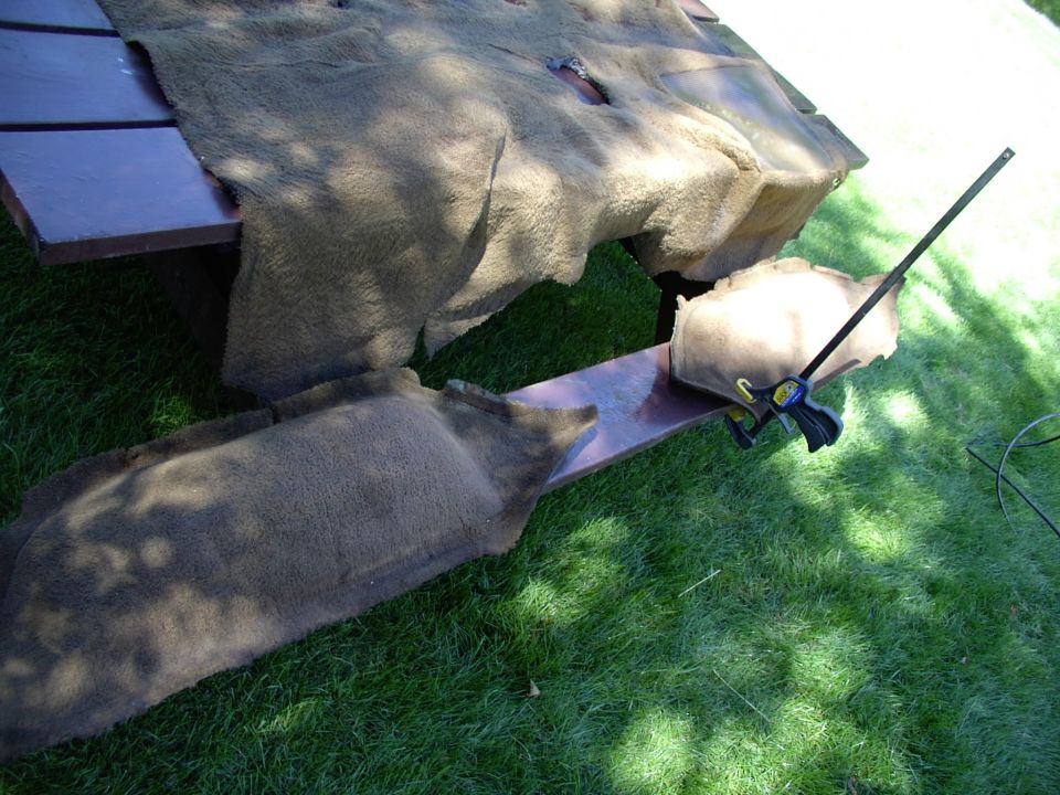 This time I pulled the wheelwell rugs off and nailed them too.  They had a pile of undercoating grease that had leached onto them, as I shoot in between the double walls through two holes from inside each well.