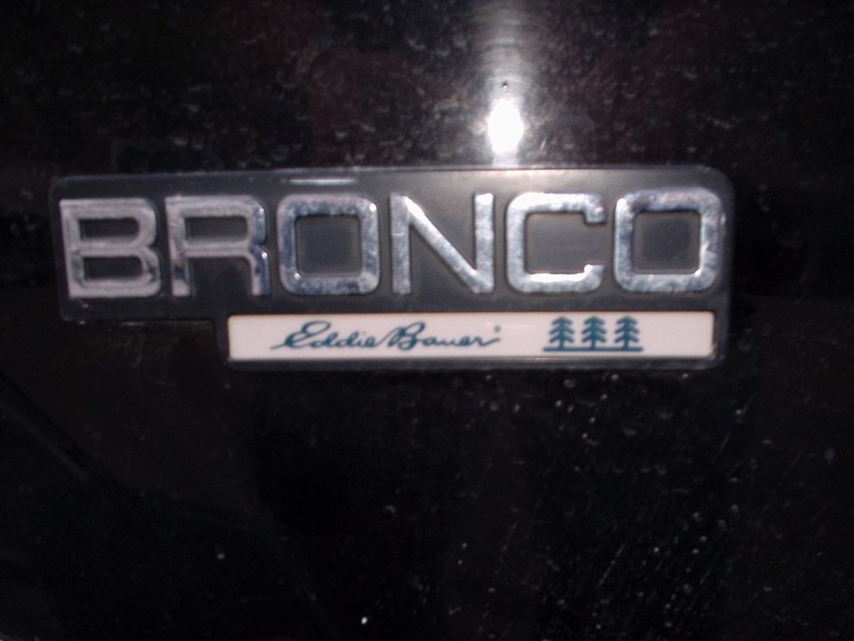 Bronco Eddie Bauer emblem on black background