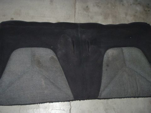 1994 Ford Probe - A car floor mat is shown from above, revealing its shape and texture.