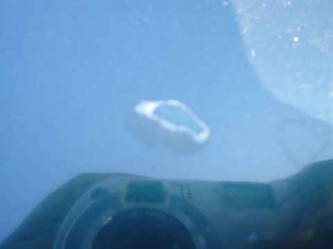 1993 Ford Taurus - This photo shows a camera's reflection in water, not a 1993 Ford Taurus.