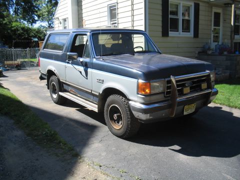 1979 Ford Bronco - This Ford Bronco features a two-tone paint scheme and a brush guard on the front bumper.