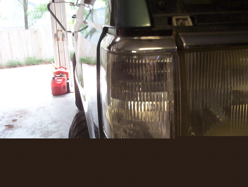 1989 Ford Bronco front corner with clear turn signal and headlight