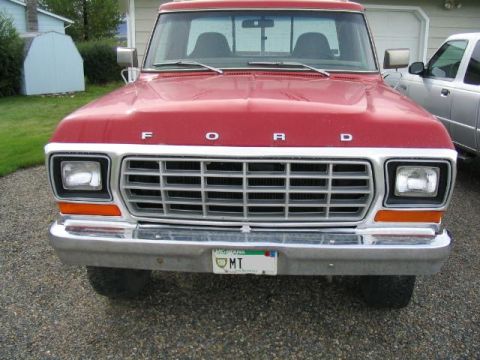 1979 Ford F-150 - Front view of a red 1979 Ford F-150 pickup truck, its distinctive grille and headlights.