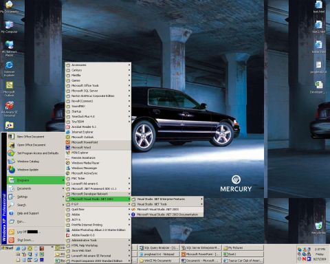 2000 Ford Taurus - A black Mercury sedan is visible on a computer desktop background.