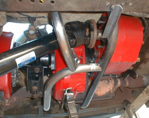 1990 Ford Bronco - Underside view of a vehicle's drivetrain, showing the transmission, driveshaft, and exhaust system.