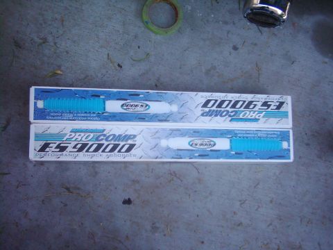 1978 Ford Bronco - Two Pro Comp ES9000 performance shock absorbers are shown in their packaging.