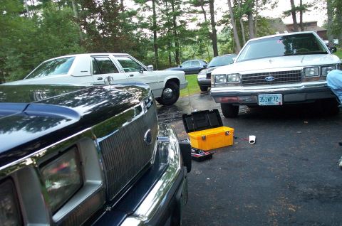 1991 Ford LTD Crown Victoria - A 1991 Ford Crown Victoria LTD is parked in a driveway with other vehicles and a toolbox.