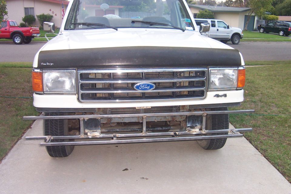 1990 Ford Bronco front view with custom metal bumper bars
