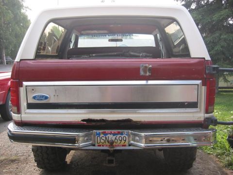 1985 Ford Bronco - Here's my tailgate. Bottom is totally rusted out. The Tension bar snapped a weld and took out my window