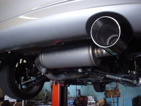 1993 Ford Taurus - Underside view of a silver car's Magnaflow exhaust system.