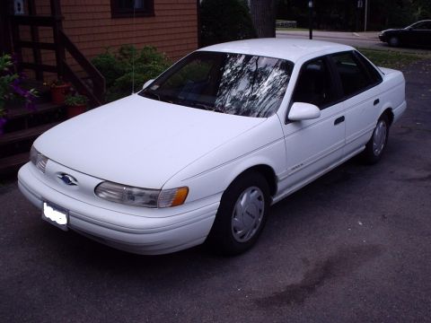 1998 Ford Taurus - This sedan appears to be a Ford Taurus from the mid-1990s, likely a 1996 or 1997 model.