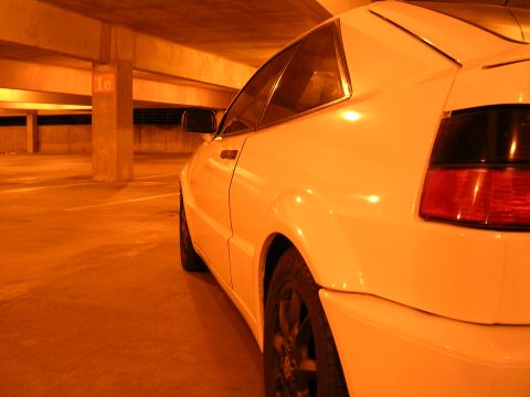 1990 Volkswagen Corrado - Rear view of a white 1990 Volkswagen Corrado parked indoors.