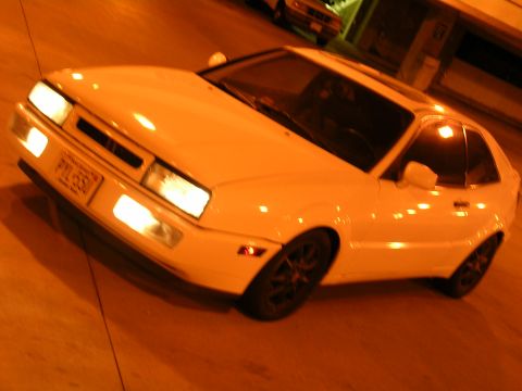 1990 Volkswagen Corrado - Front 3/4 view of a white 1990 Volkswagen Corrado parked outdoors at night.