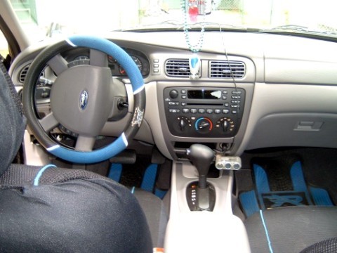 2004 Ford Taurus - Interior view of a 2004 Ford Taurus, showing the dashboard, steering wheel, and center console.
