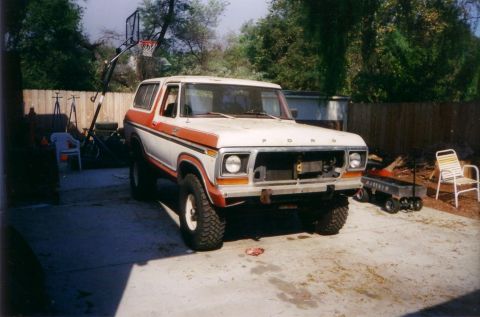 1978 Ford Bronco - This 1978 Ford Bronco is parked in a residential driveway, showing its front end and side profile.