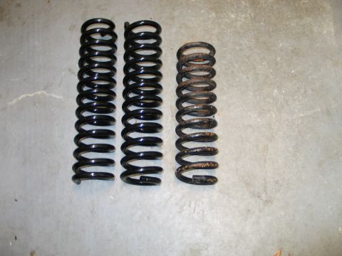 1992 Ford Bronco - 4" coil on right, 9" coil on left. these are big!
