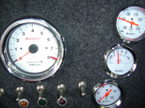 1971 Ford Ranchero - Aftermarket Instrument Panel: Sunpro: Oil PSI, voltometer, water temeperature, and Tachometer. There are also 5 toggle switches, one for th…