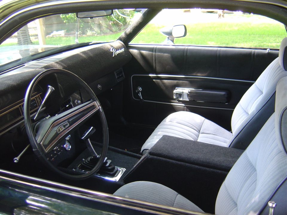 Interior Shot showing aftermarket bucket seats.