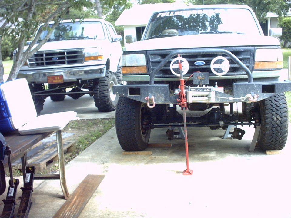 Slid the axle under the truck temporarily.