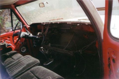 1978 Ford Bronco - Interior view of a vehicle undergoing restoration, with the dashboard removed and wiring exposed.