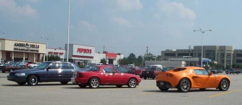 1998 Ford Crown Victoria - Anyone know what the orange car is?