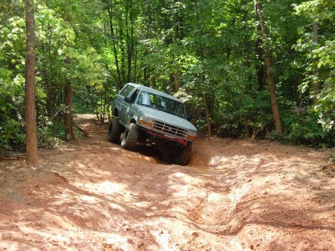 1995 Ford Bronco - Hitting some seldom seen mud. Pretty dry day.