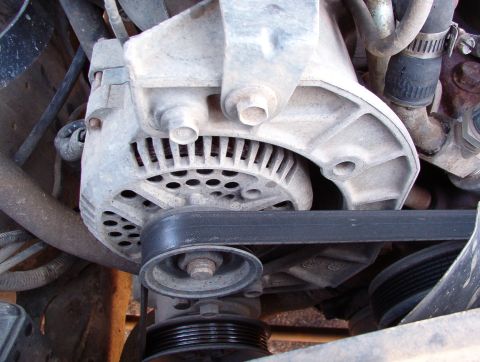 1983 Ford Bronco - 130A alternator from V6 Taurus (8 1/8" between the mounting bolts, & case clocked for this application) in the factory bracket on my '…