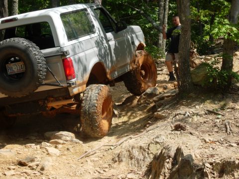 1995 Ford Bronco - This 1995 Ford Bronco is navigating a challenging, wooded off-road course.