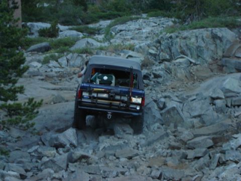 1991 Ford Bronco - Blue 1991 Ford Bronco tackles a challenging rocky trail.
