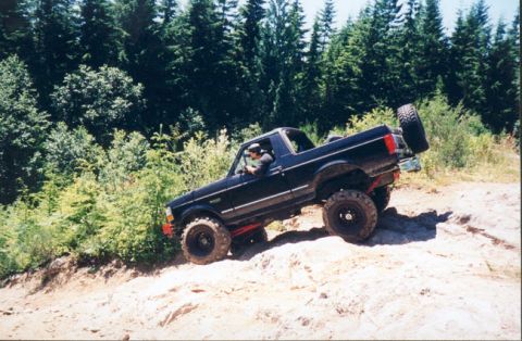 1993 Ford Bronco - This 1993 Ford Bronco is navigating a challenging off-road course.