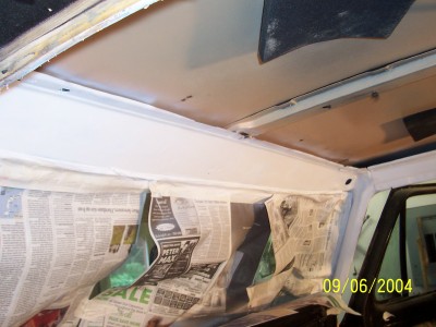 1979 Ford Bronco - Vehicle interior covered with newspaper during repair work. A date stamp indicates 09/06/2004.