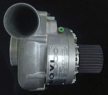 1998 Ford Crown Victoria - Novi 2000 centrifugal supercharger with a toothed drive pulley and inlet snout, shown against a black background.
