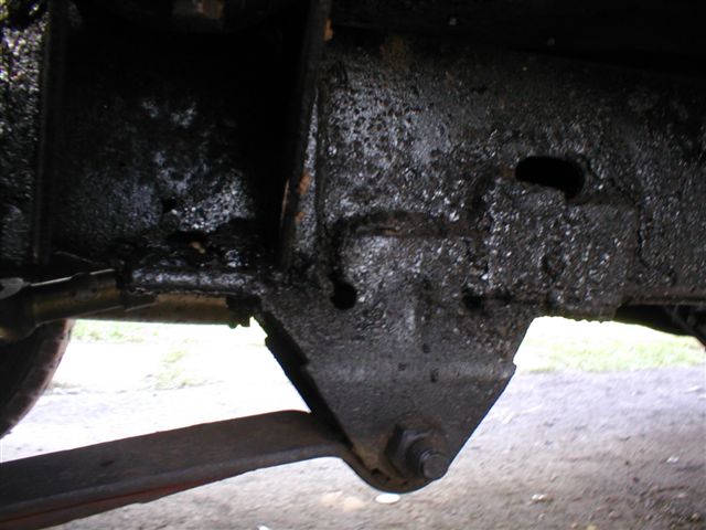 Leaf spring attached to a heavily greased frame bracket