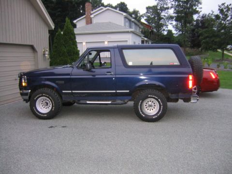 1994 Ford Bronco - Riding higher on 33”, no lift, minor trimming of the bumper