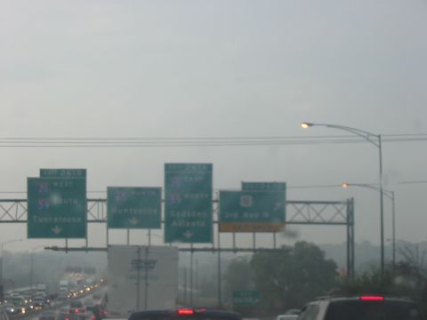 1988 Ford Bronco - Overhead highway signs indicate routes to Tuscaloosa, Huntsville, Gadsden, and Atlanta under a hazy sky.
