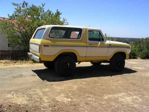 1978 Ford Bronco - This 1978 Ford Bronco is seen from the side under a clear blue sky.