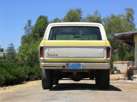 1978 Ford Bronco - This 1978 Ford Bronco is seen from the rear, a two-tone yellow and white paint scheme.