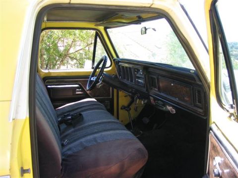 1978 Ford Bronco - Interior view of a 1978 Ford Bronco showing the driver's side seat and dashboard.