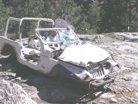 1994 Ford Bronco - just before decending to the first water crossing, we came across this jeep. used to be lower down on the hill, at the water