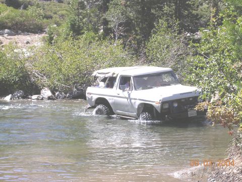 1994 Ford Bronco - This 1978 Ford Bronco is navigating a stream on a sunny day.