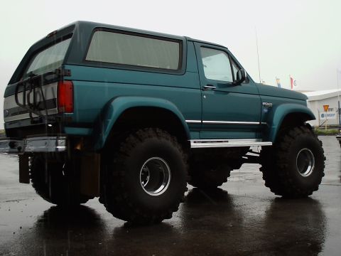 1996 Ford Bronco - This 1996 Ford Bronco is equipped with massive tires, giving it a lifted appearance.