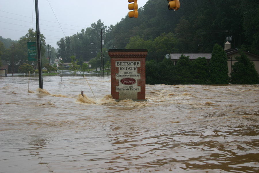 Flooded street with Biltmore Estate sign