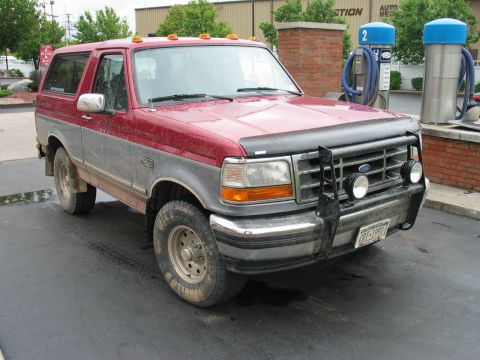 1995 Ford Bronco - This Ford Bronco, likely from the early to mid-1990s, is shown from a three-quarter front view.