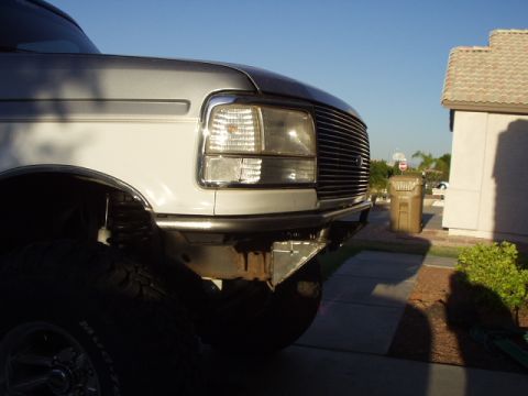 1993 Ford Bronco - Front corner view of a 1992 Ford Bronco with a chrome grille and custom bumper.