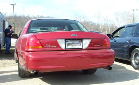 1998 Ford Crown Victoria - The Kenny Brown Panther. Note the Ronal Wheels and sublte badging right of the rear fascia.