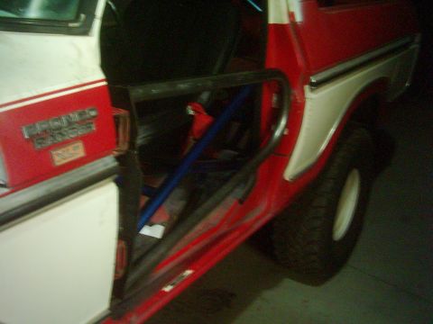 1978 Ford Bronco - Interior view of a 1978 Ford Bronco, highlighting the "BRONCO RANGER" badging and roll cage.