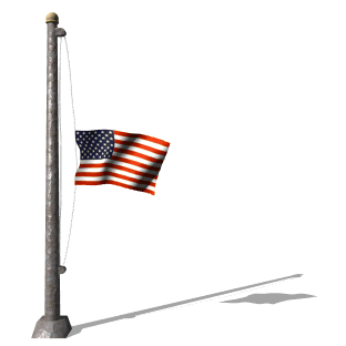 1988 Ford Bronco - An American flag flies proudly on a flagpole, casting a long shadow on a bright day.