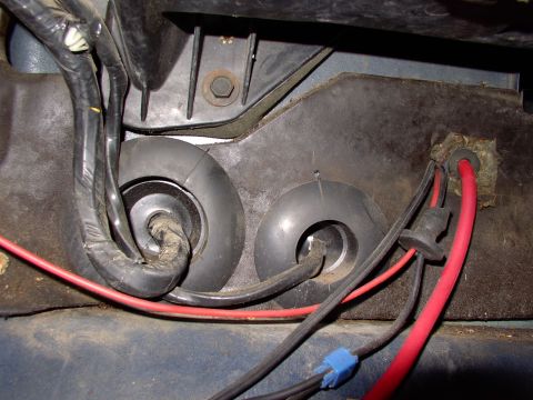 1986 Ford Bronco - Here is the 4 gauge wire to the amps coming in through the firewall (properly grommeted to prevent major meltdowns). It's coming from the 6…