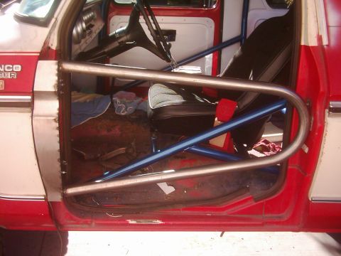 1978 Ford Bronco - Custom tube doors and roll cage installed in a 1978 Ford Bronco interior.