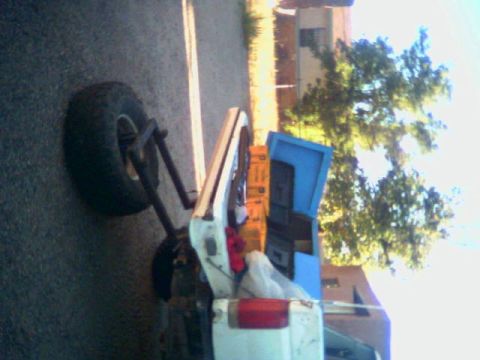 1987 Ford Bronco - how it folds down, no spring assist at this time. it is a real nice step onto the tail gate